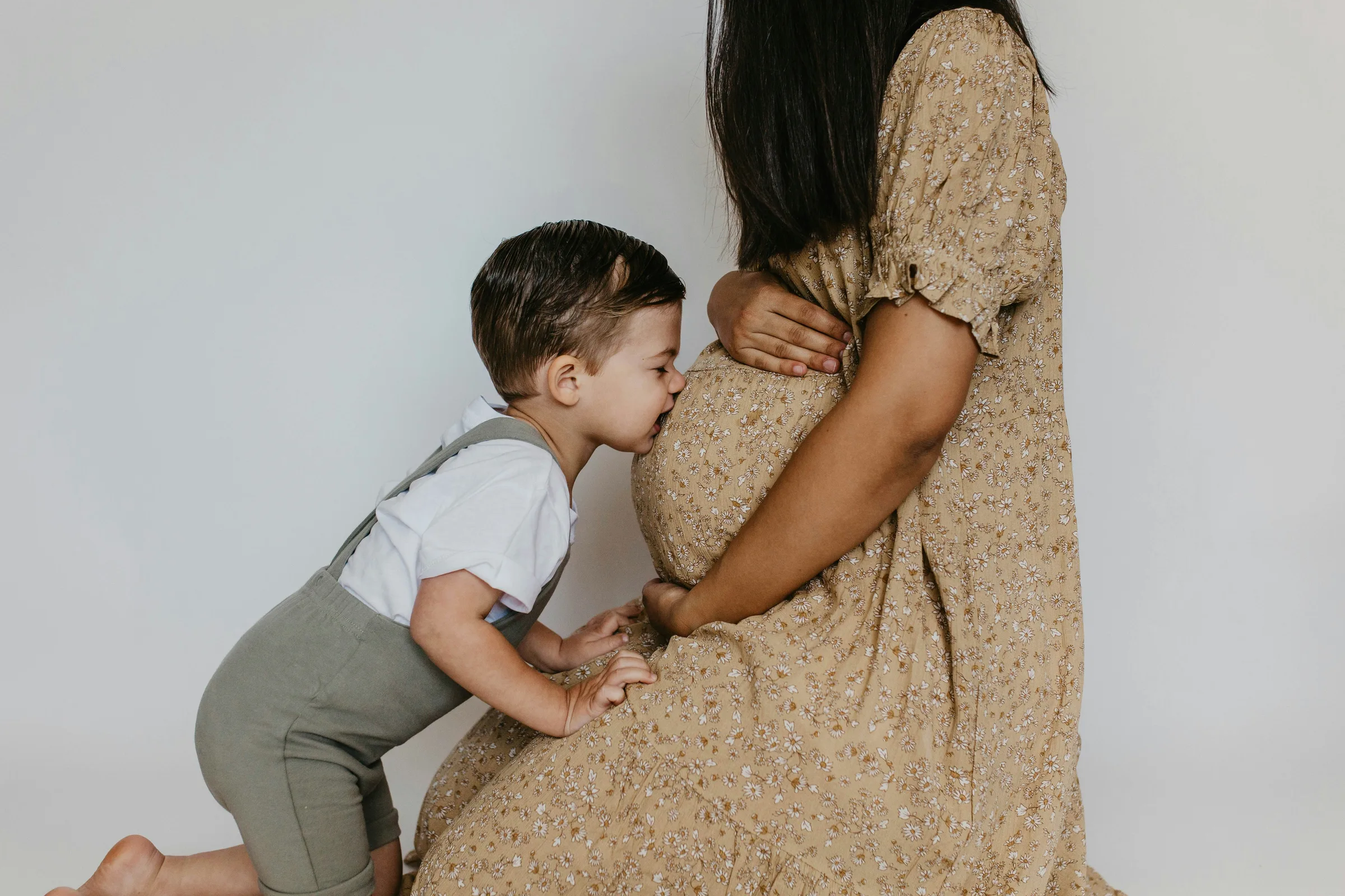 pregnant mum and her son